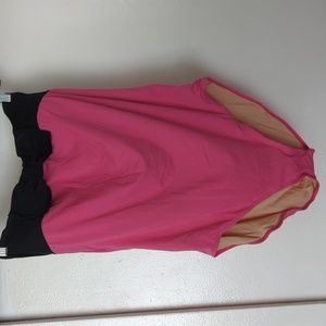 Pink strapless swimsuit.